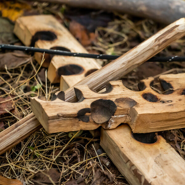 Bushcraft skills such as firelighting and shelter building in schools