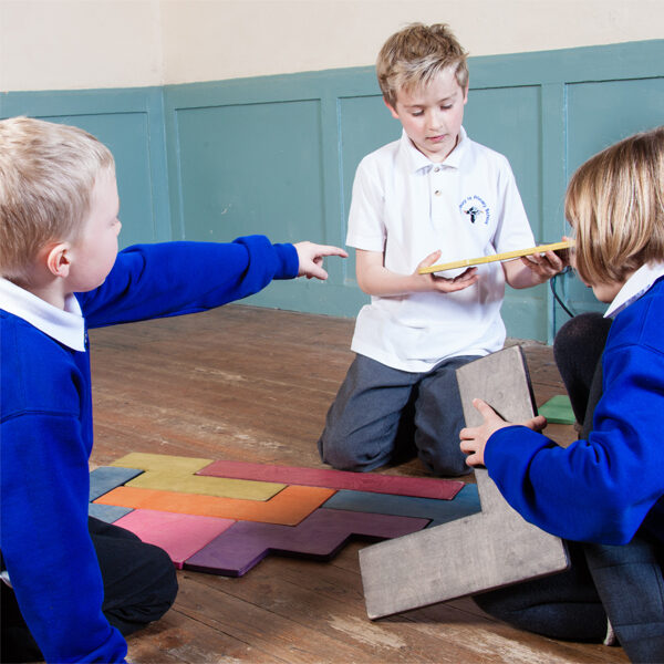 KS1 children enjoying a hands-on maths workshop