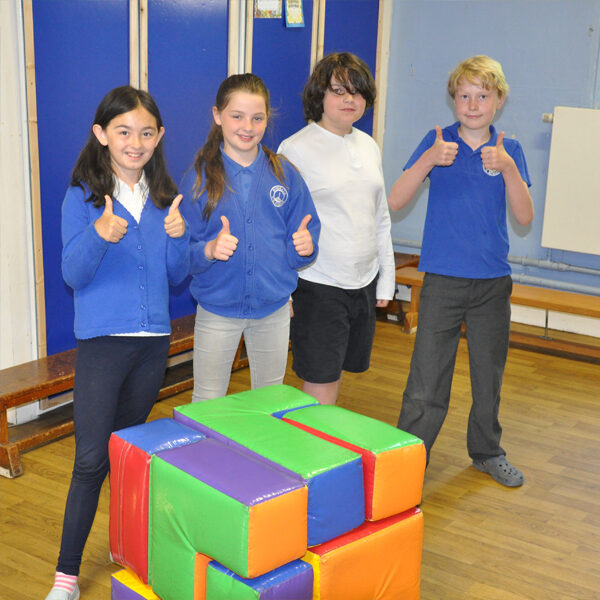 KS2 pupils developing problem solving skills in a maths workshop