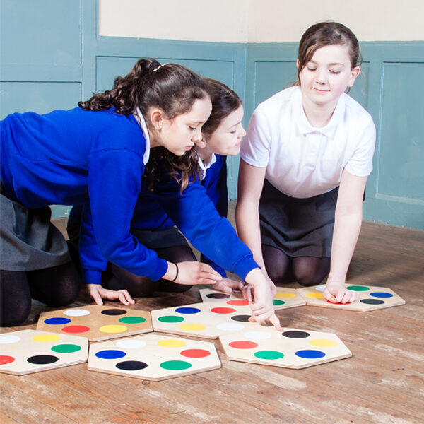 KS2 pupils collaborating on maths problem solving tasks