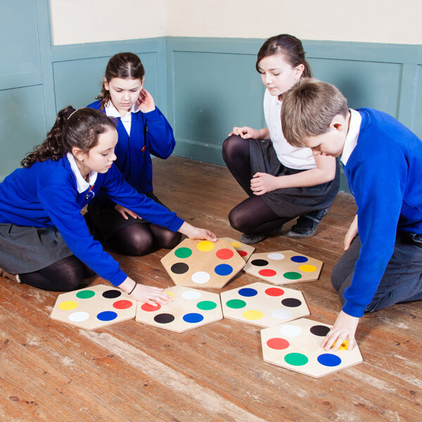 Key Stage 2 pupils participating in a maths problem solving workshop