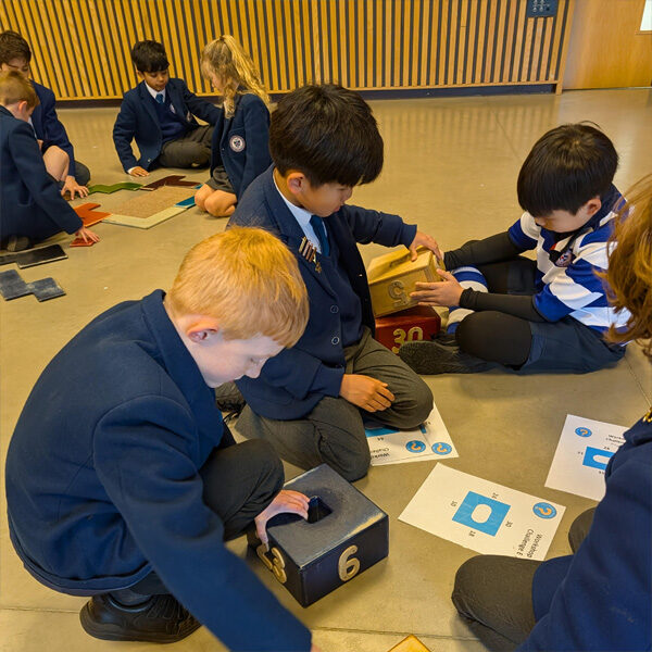 Pupils developing maths communication skills during workshop