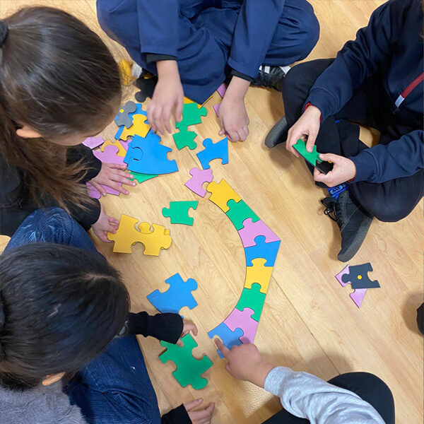 Maths and logic problem solving day using large hands on puzzles