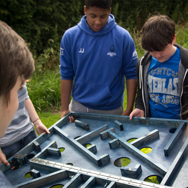 Secondary school activity week featuring challenge carousel team tasks