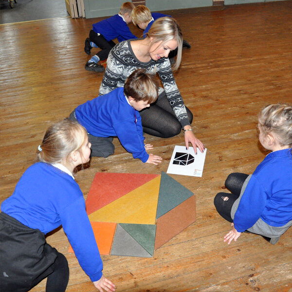 KS1 pupils developing cooperation and communication skills during a team building day