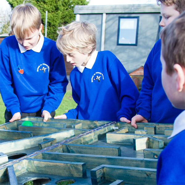 KS2 pupils strengthening teamwork and cooperation during enrichment activities